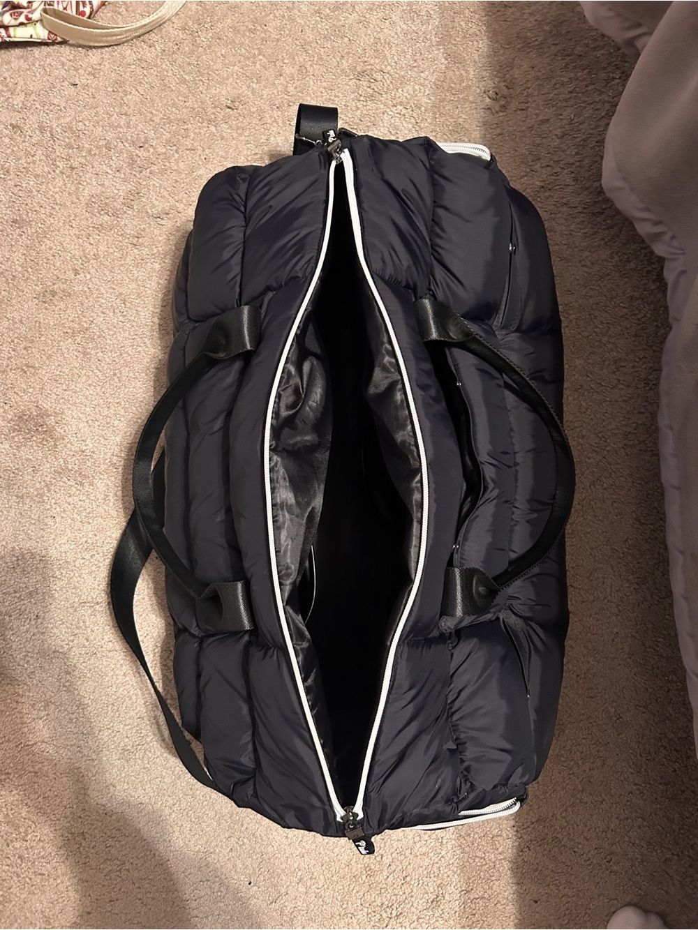 P'tula Black Quilted Travel Duffel with White Trim